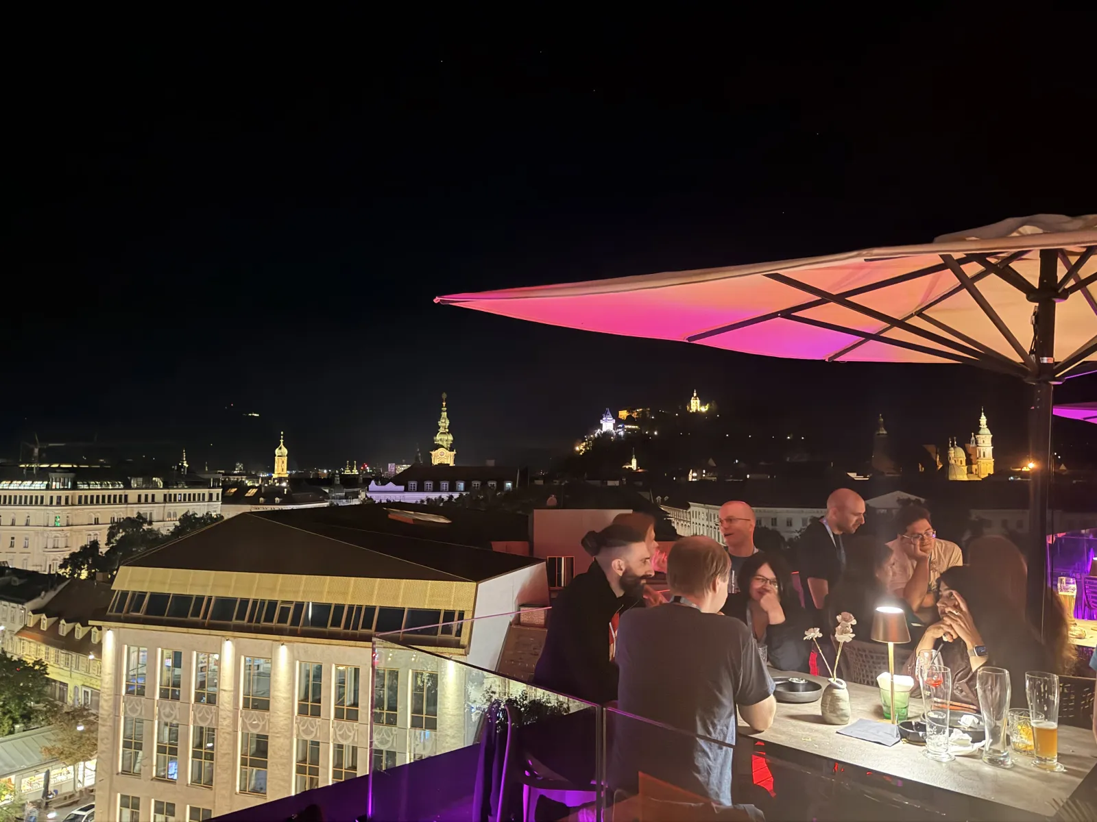 Graz lit up at night as nerds gather and drink